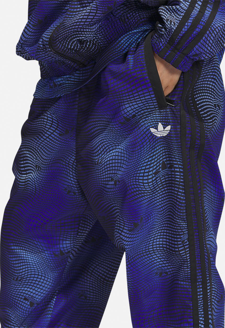 adidas Originals - MV Allover print track pants - blue