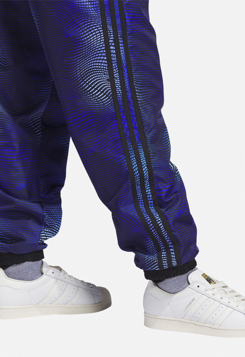 adidas Originals - MV Allover print track pants - blue