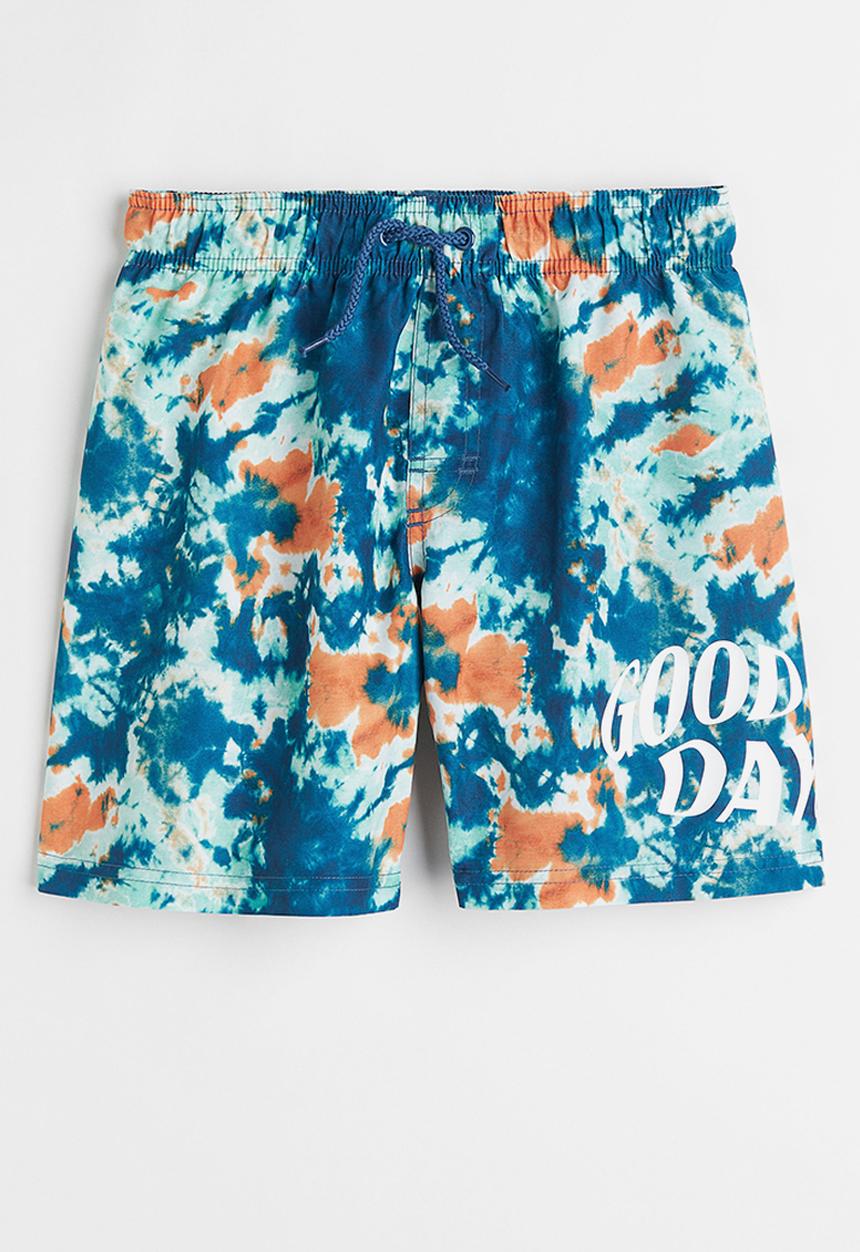 H&M - Patterned swim shorts - blue patterned 
