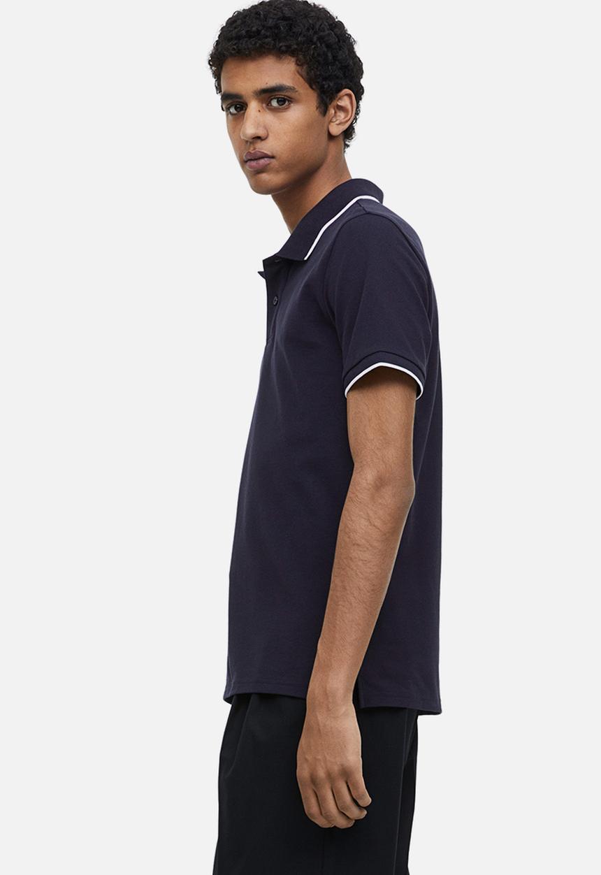 H&M - Slim fit cotton polo shirt - navy blue