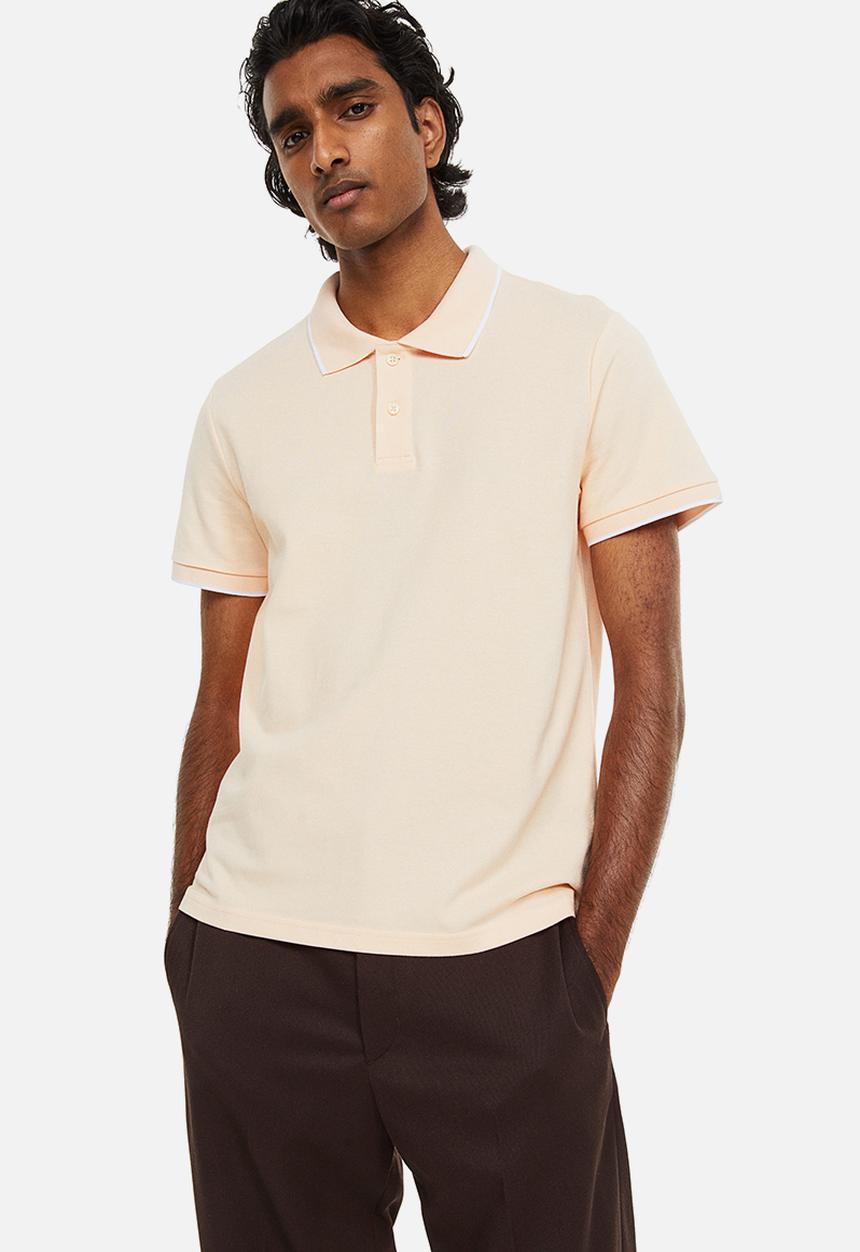 H&M - Slim fit cotton polo shirt - light apricot 
