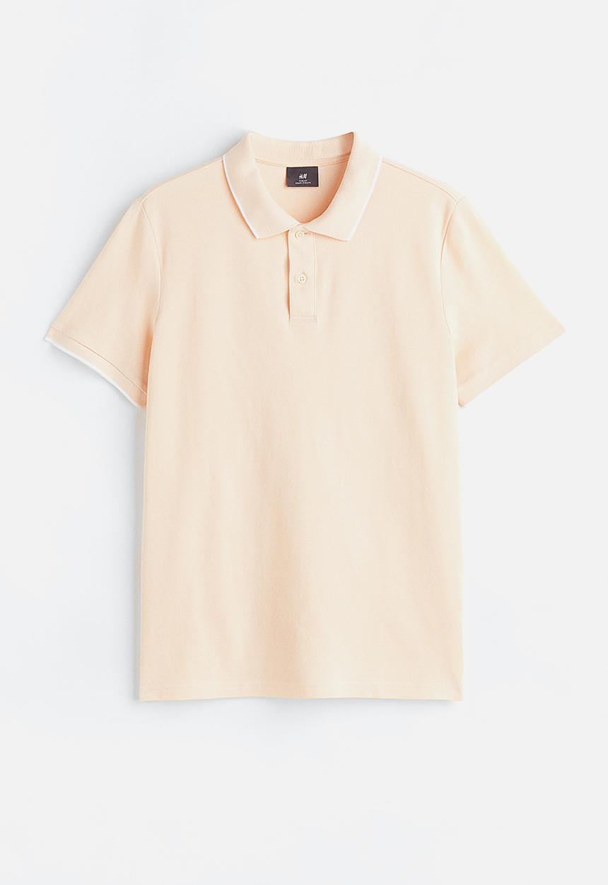 H&M - Slim fit cotton polo shirt - light apricot 