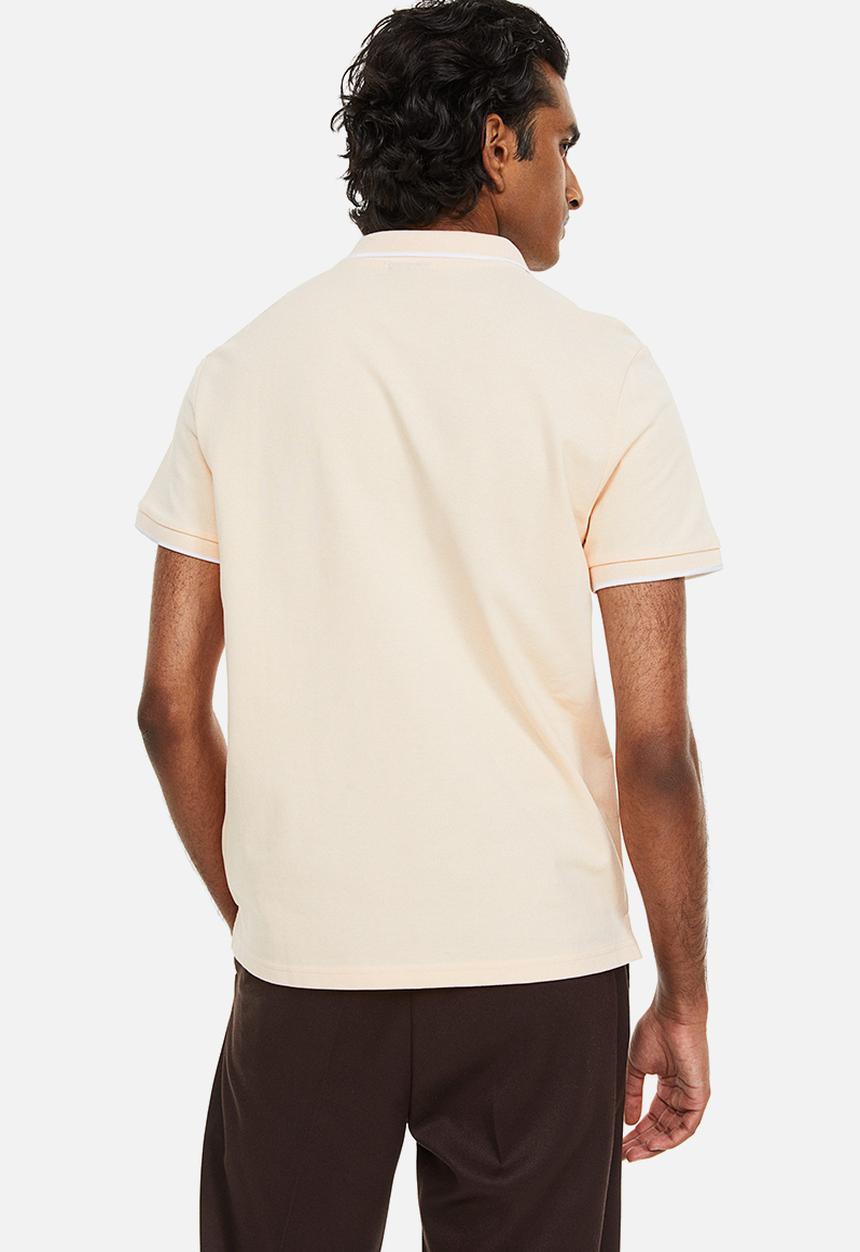 H&M - Slim fit cotton polo shirt - light apricot 