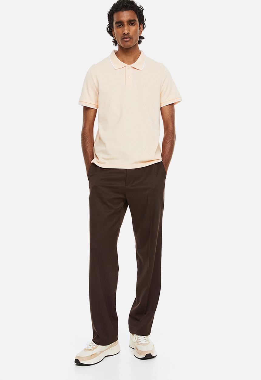 H&M - Slim fit cotton polo shirt - light apricot 