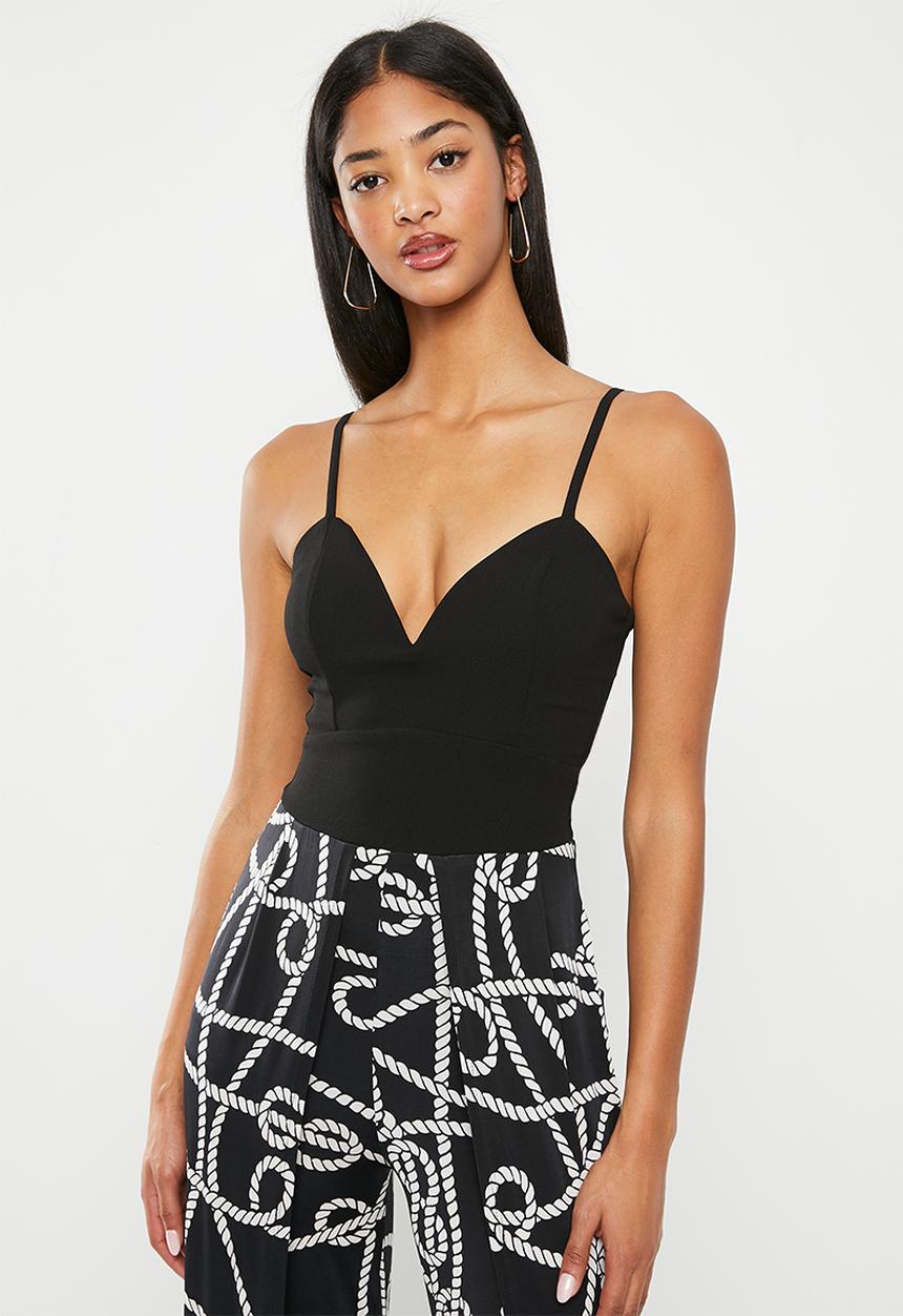 SISSY BOY - Mixed jumpsuit with leg opening - black chain print