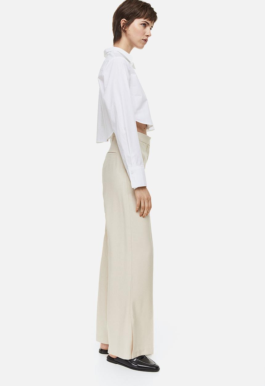 H&M - Slit-hem trousers - light beige 
