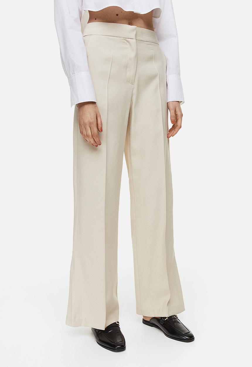 H&M - Slit-hem trousers - light beige 