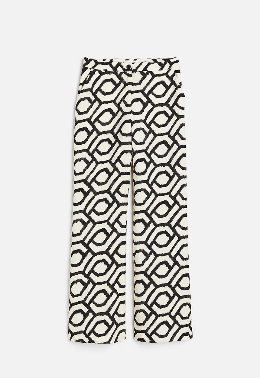 H&M - Flared trousers - cream patterned 