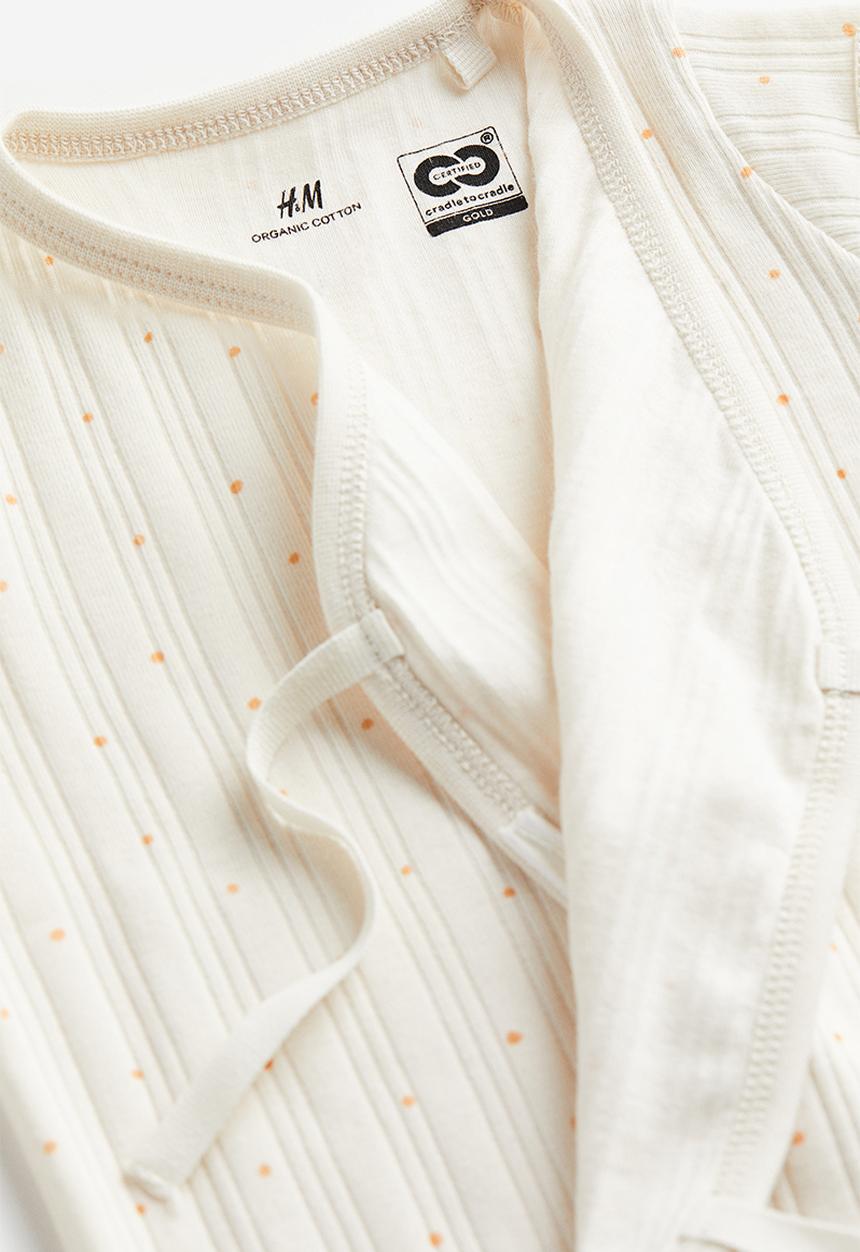 H&M - Wrapover cotton romper suit - white / spotted 
