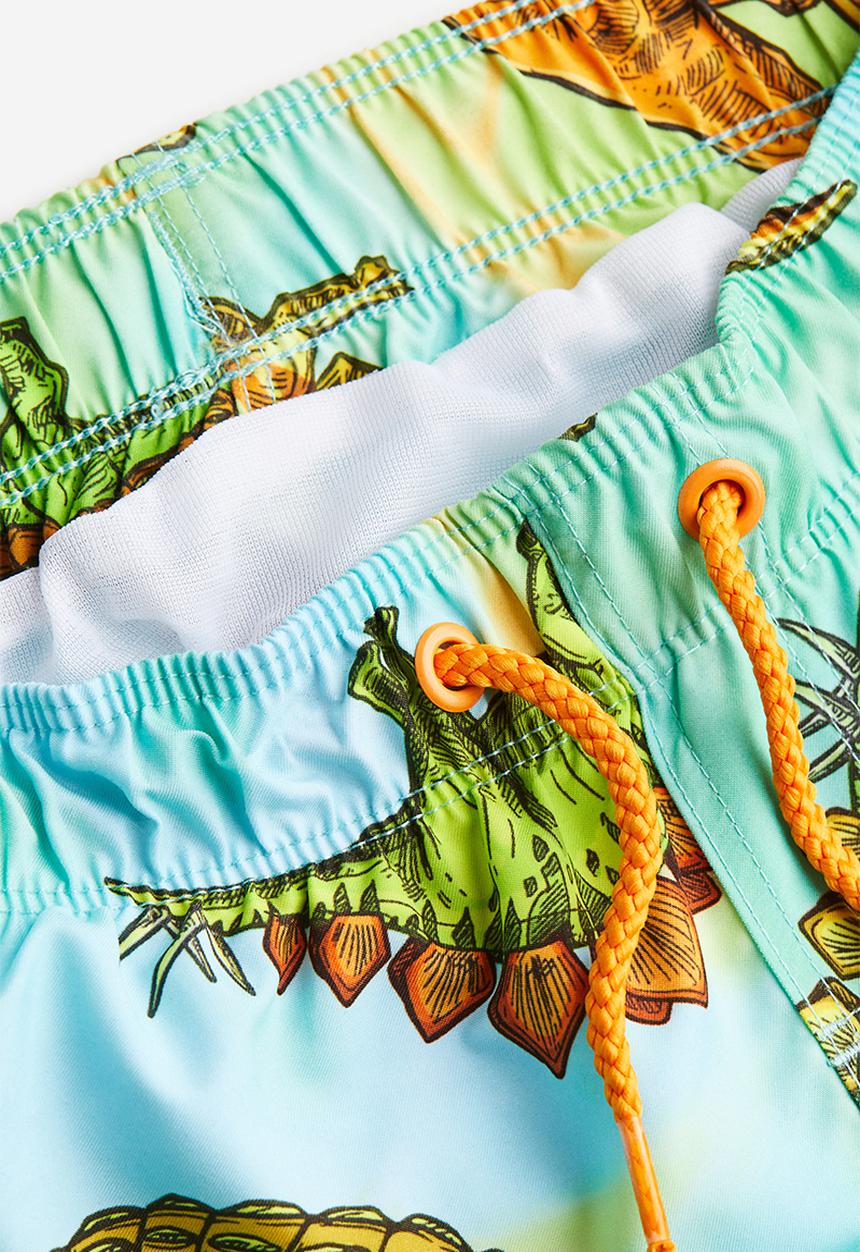H&M - Patterned swim shorts - turquoise dinosaurs