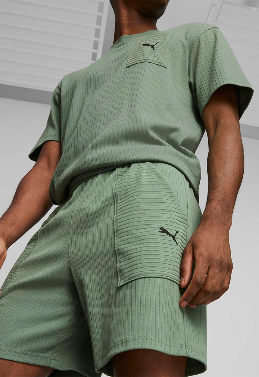 PUMA - M studio unwind 7" knit short - green 