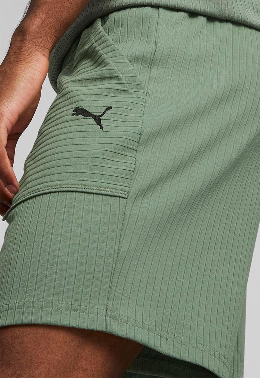 PUMA - M studio unwind 7" knit short - green 