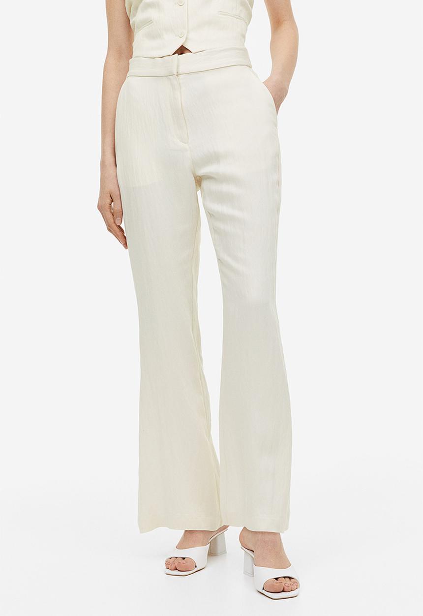 H&M - Flared viscose trousers - cream 