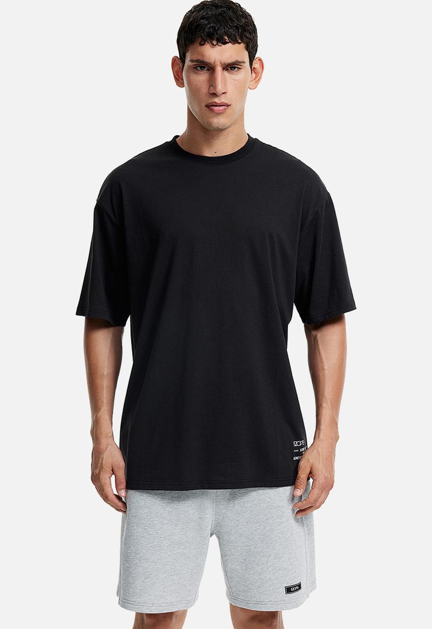 H&M - Drymove™ printed sports T-shirt - black