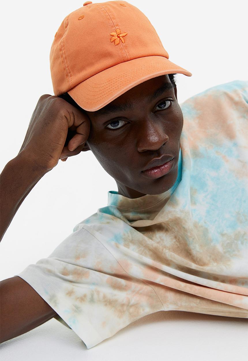 H&M - Embroidered motif cotton cap - pale orange flower