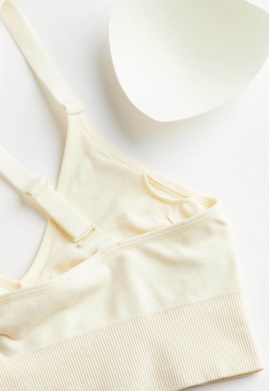 H&M - Drymove™ medium support sports bra - cream 