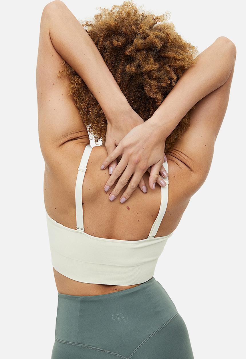 H&M - Drymove™ medium support sports bra - cream 