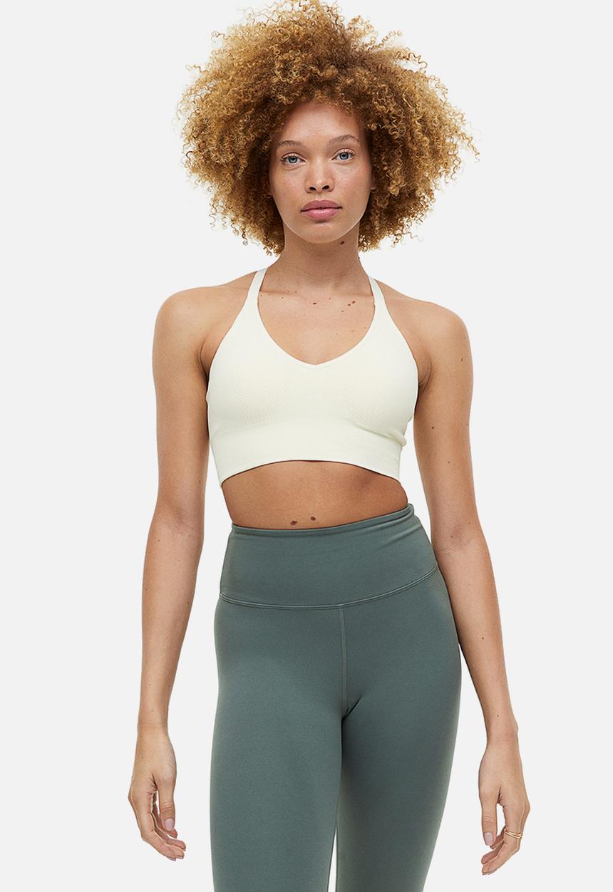 H&M - Drymove™ medium support sports bra - cream 
