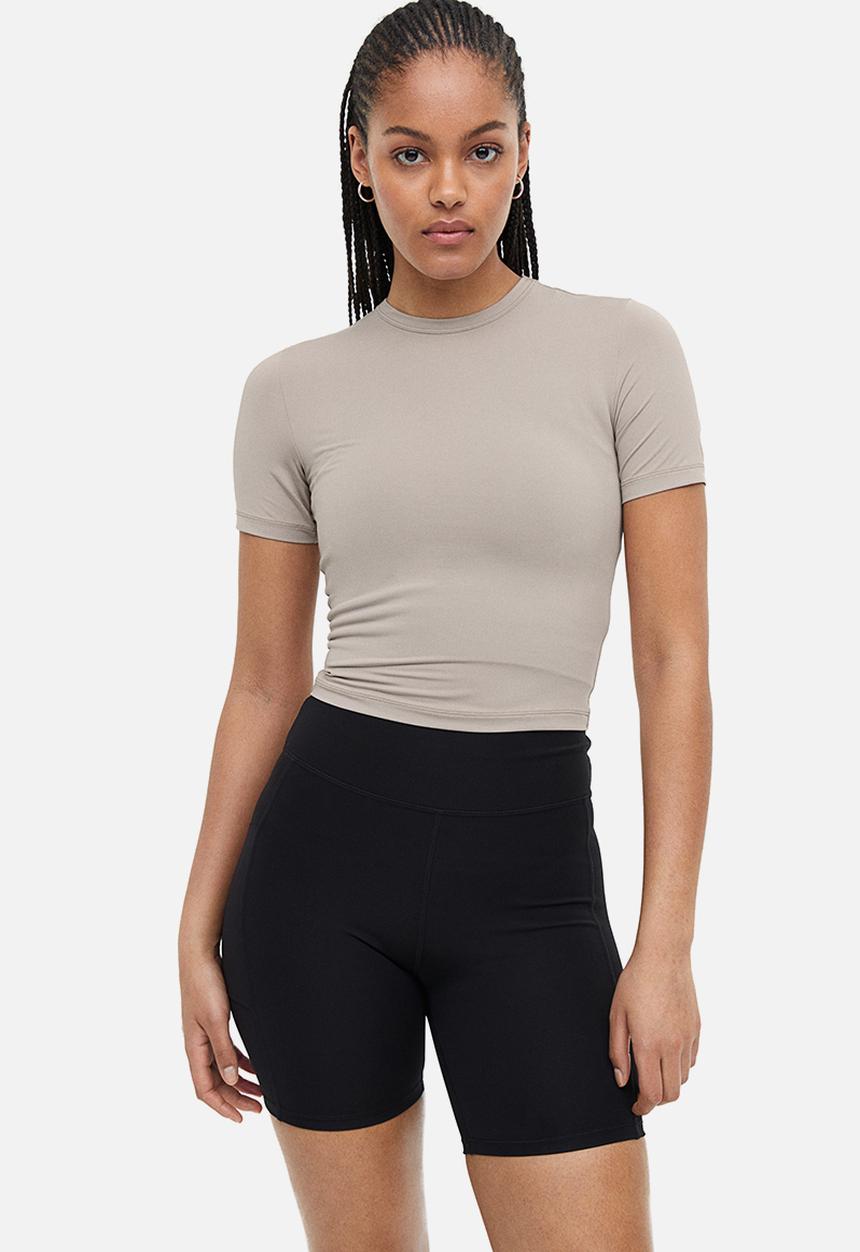 H&M - Drymove™ cropped sports top - light greige