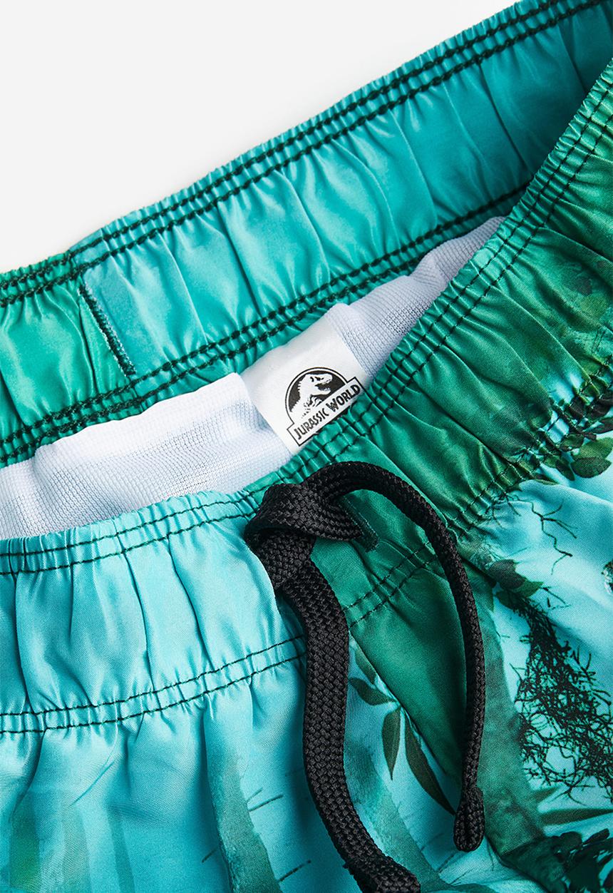 H&M - Printed swim shorts - dark green jurassic world