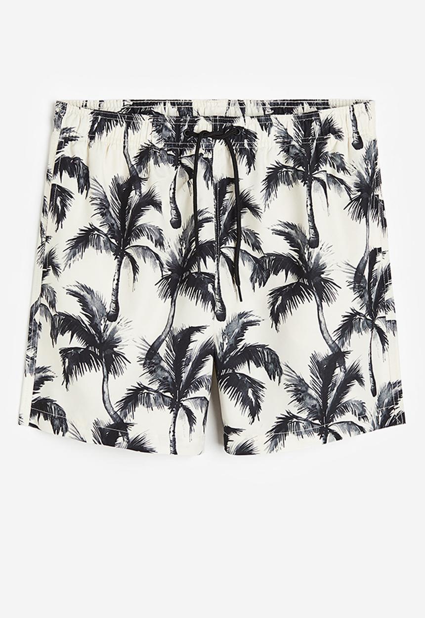 H&M - Patterned swim shorts - white palm trees