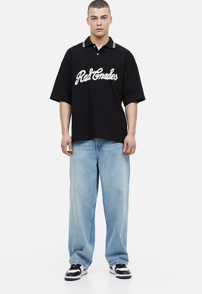 H&M - Oversized fit polo shirt - black rad grades