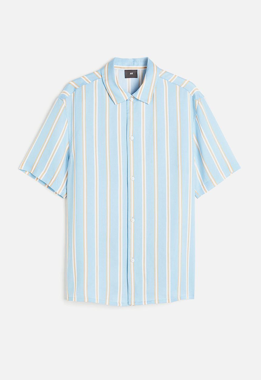 H&M - Regular fit short-sleeved lyocell shirt - light blue / striped 