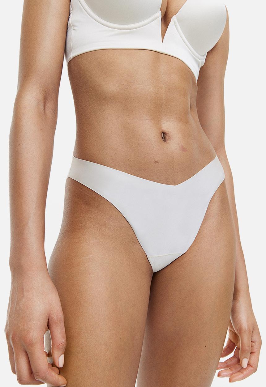 H&M - 4-Pack invisible thong briefs - dark beige & white 