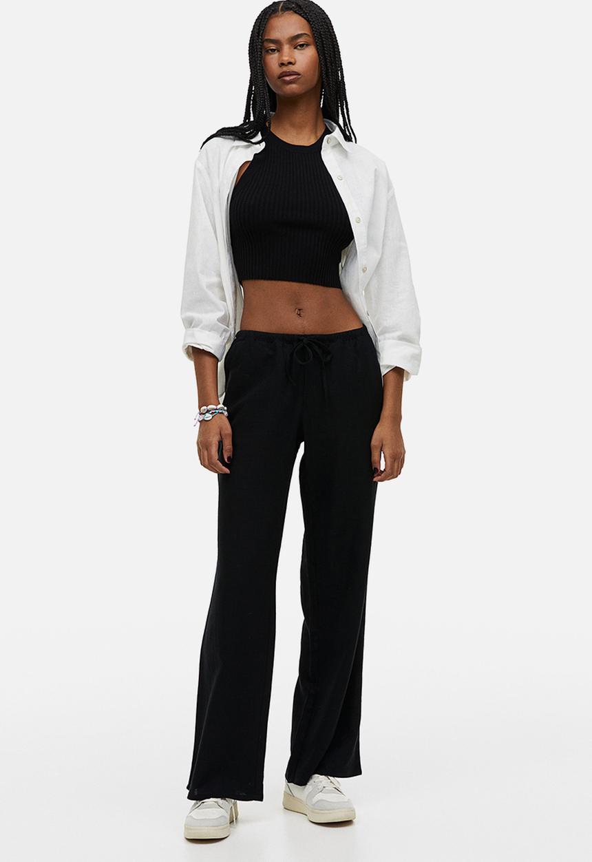 H&M - Wide trousers - black