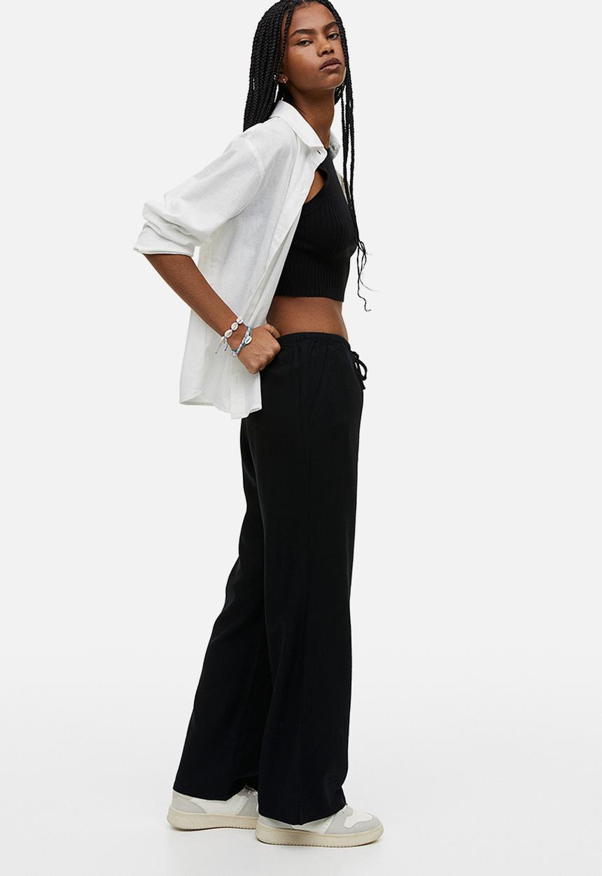 H&M - Wide trousers - black