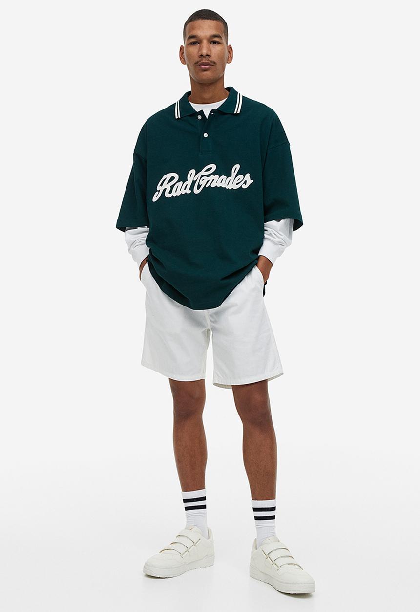 H&M - Oversized fit polo shirt - dark green rad grades 
