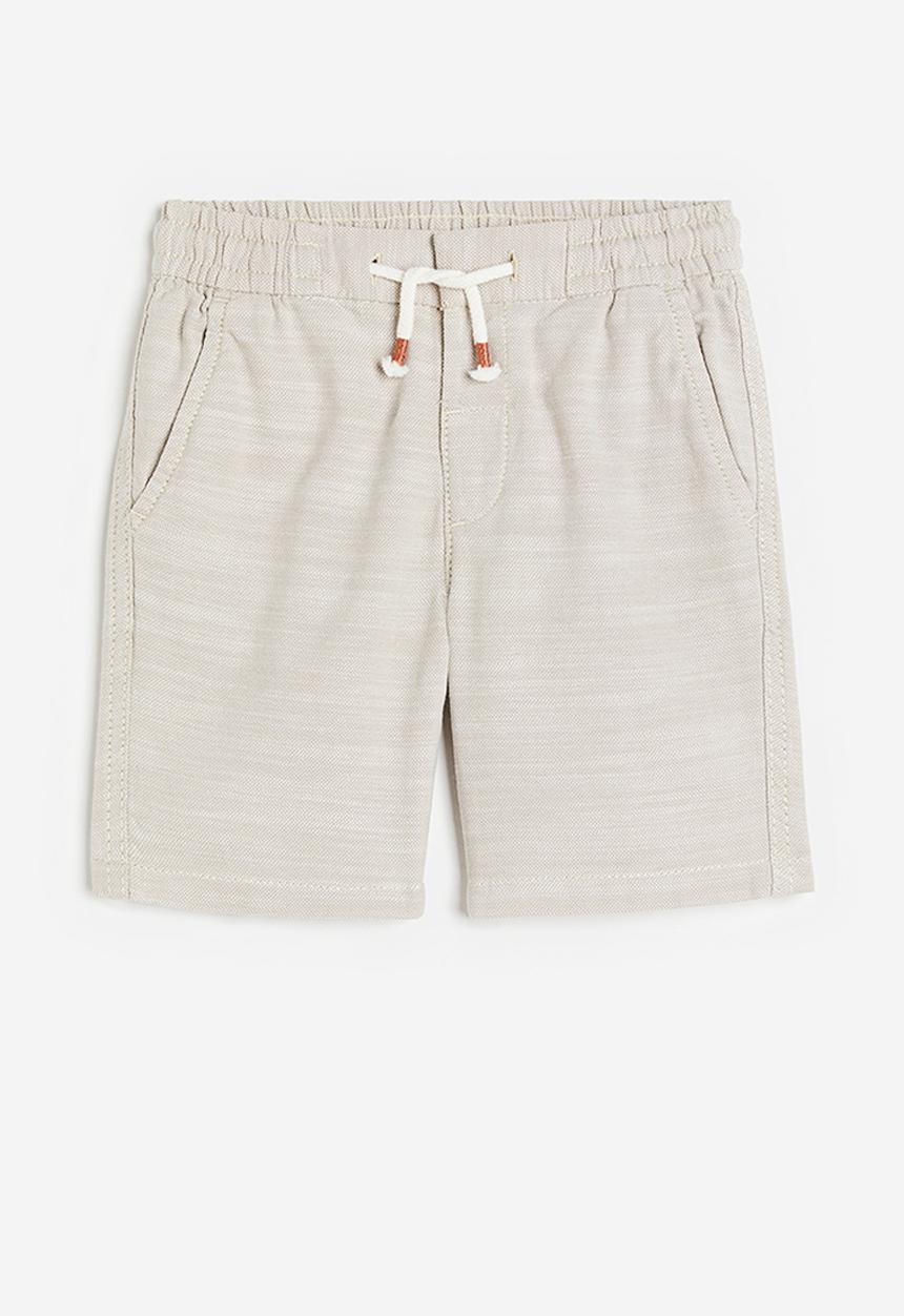 H&M - Loose fit chino shorts - light beige