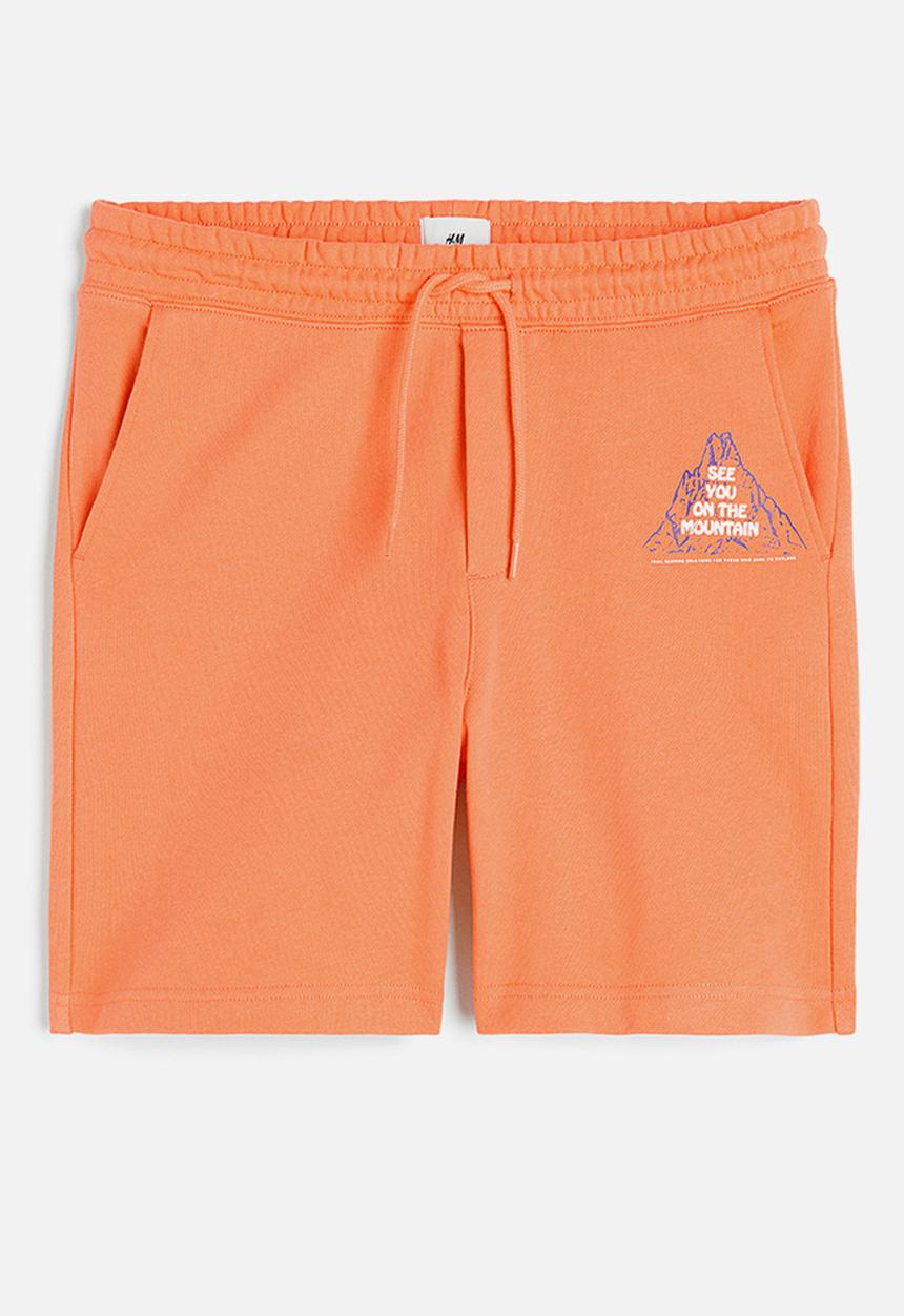 H&M - Relaxed fit printed sweatshorts - orange mountain