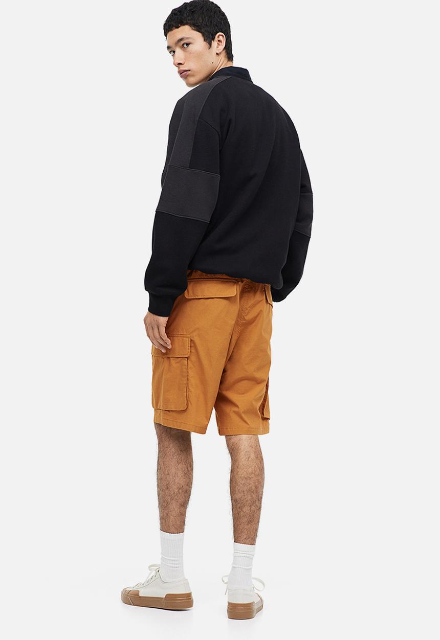 H&M - Regular fit knee-length cargo shorts - rust orange 