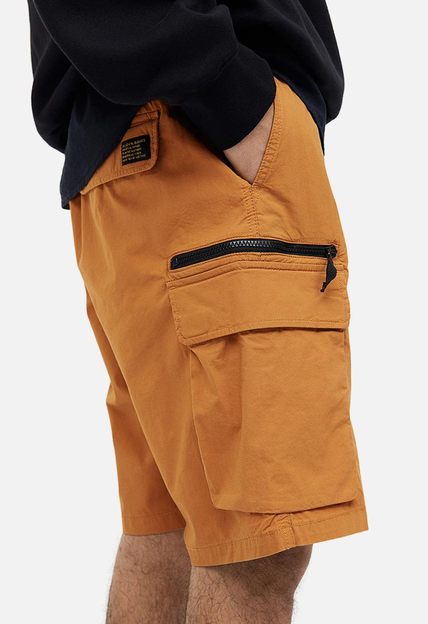H&M - Regular fit knee-length cargo shorts - rust orange 