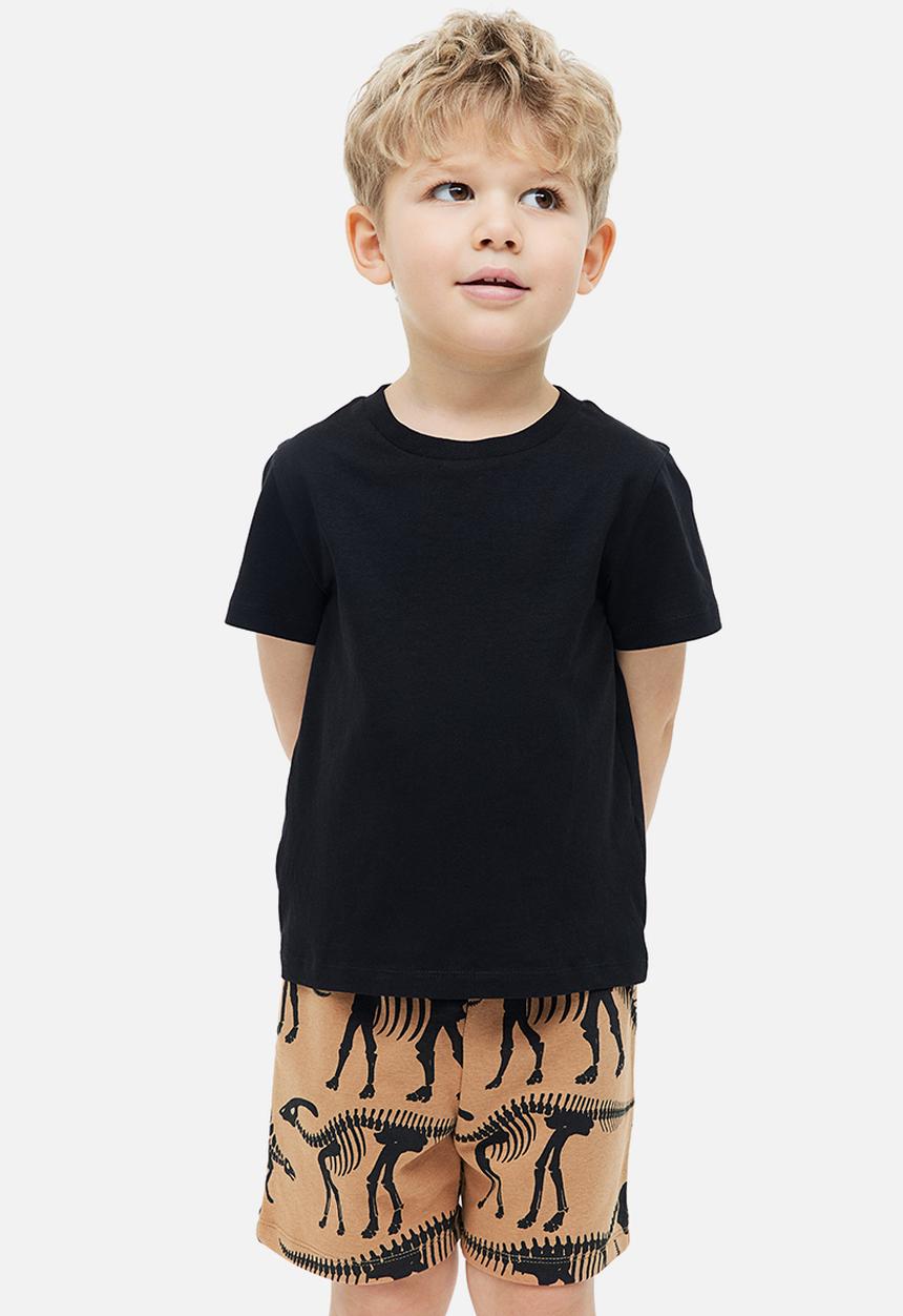 H&M - Sweatshirt shorts - dark beige/dinosaurs