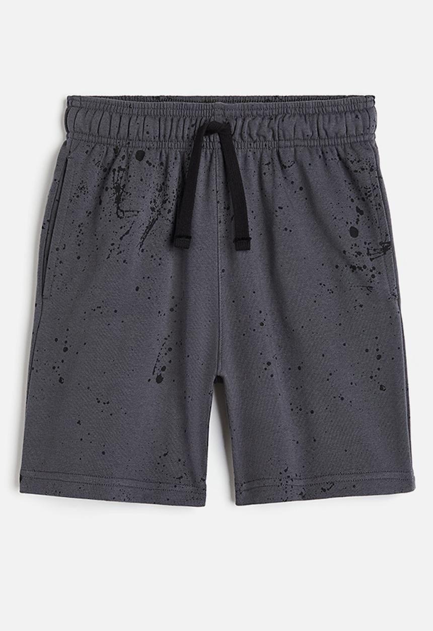H&M - Printed sweatshorts - dark grey & splatter print 