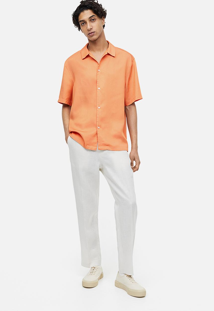 H&M - Regular fit short-sleeved lyocell shirt - apricot