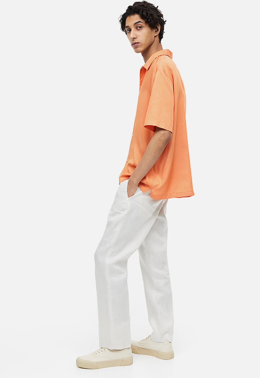 H&M - Regular fit short-sleeved lyocell shirt - apricot
