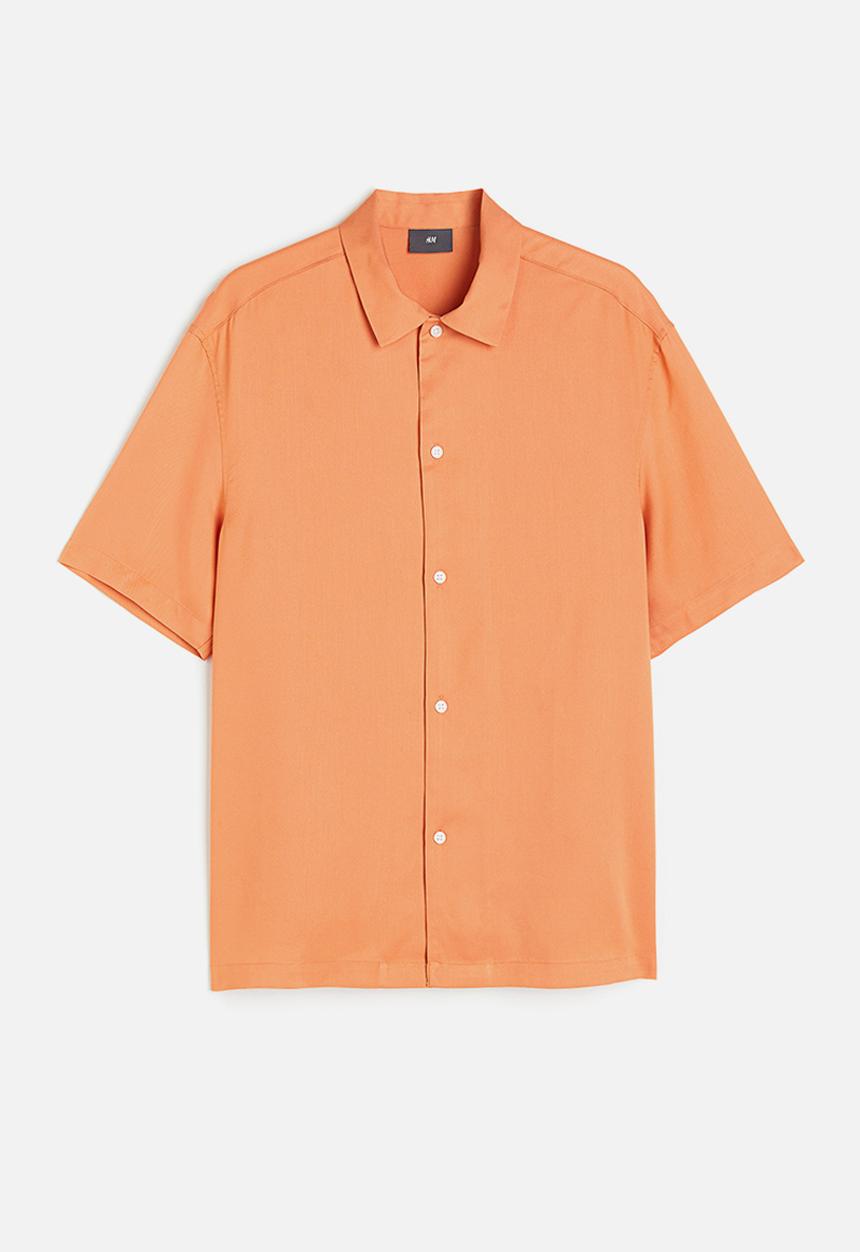 H&M - Regular fit short-sleeved lyocell shirt - apricot