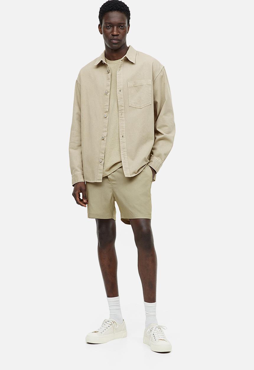 H&M - Regular fit lyocell shorts - sage green 