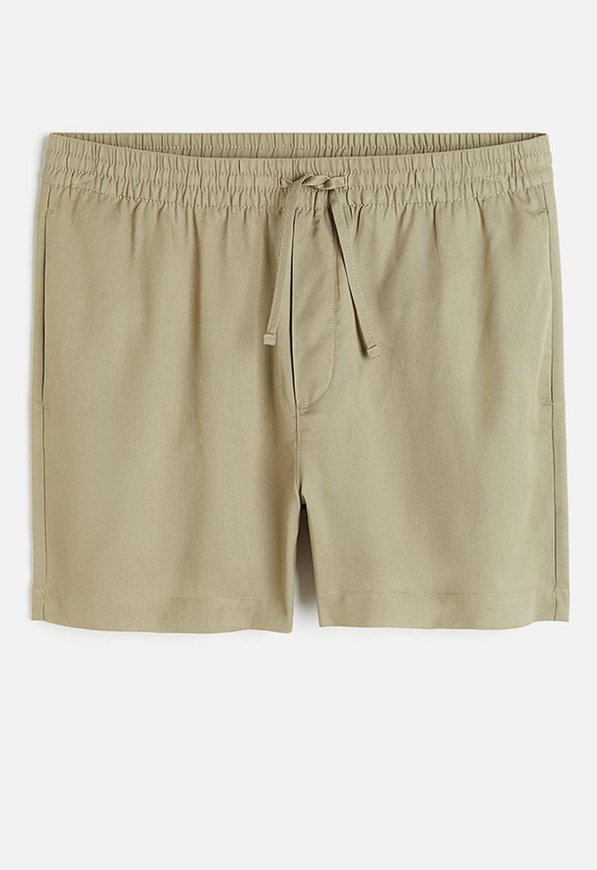 H&M - Regular fit lyocell shorts - sage green 
