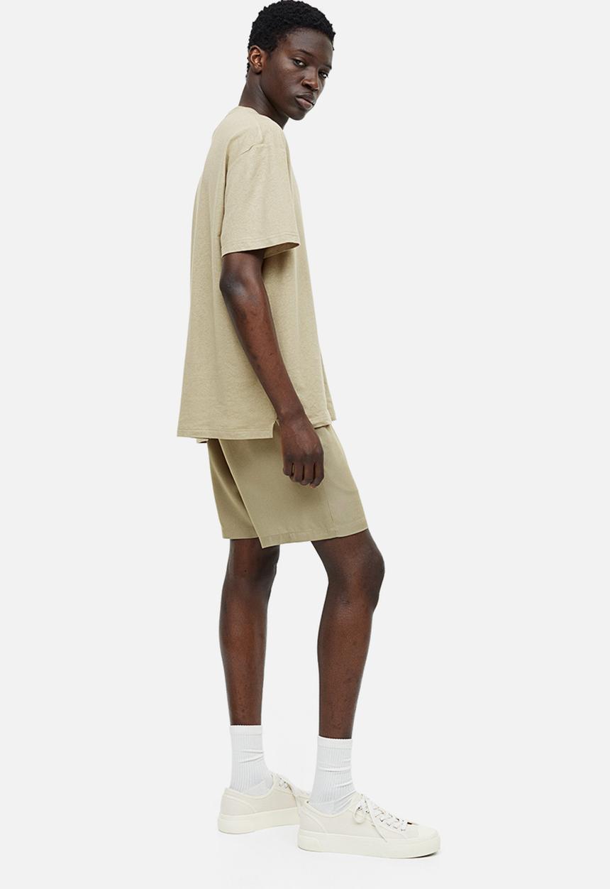 H&M - Regular fit lyocell shorts - sage green 