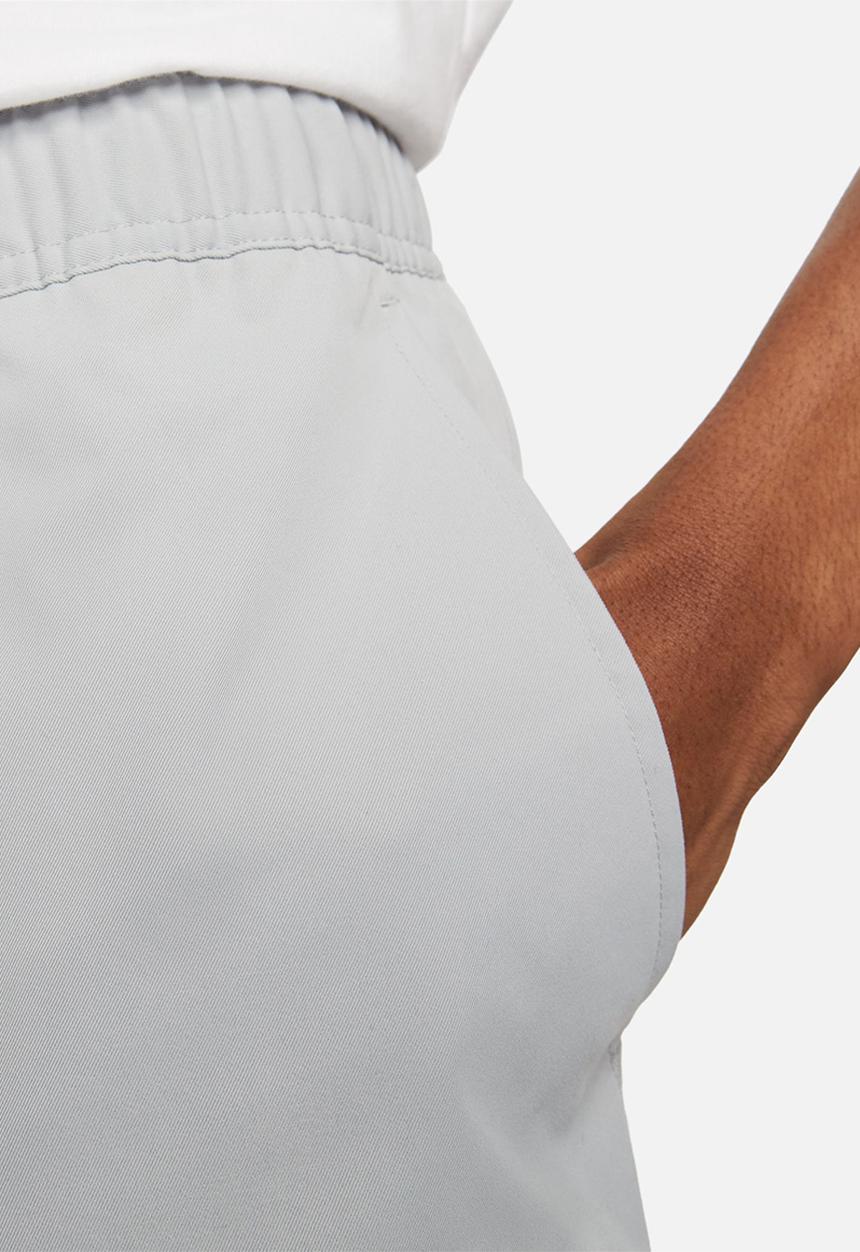 Nike - Nike club woven taper leg pants - light smoke grey