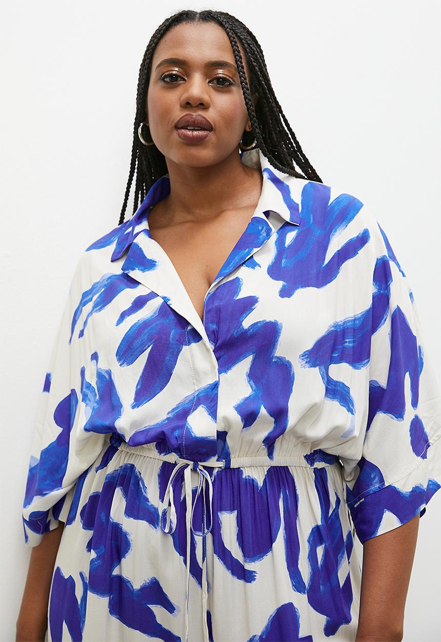 Superbalist - Relaxed printed short sleeve jumpsuit - painted ladies