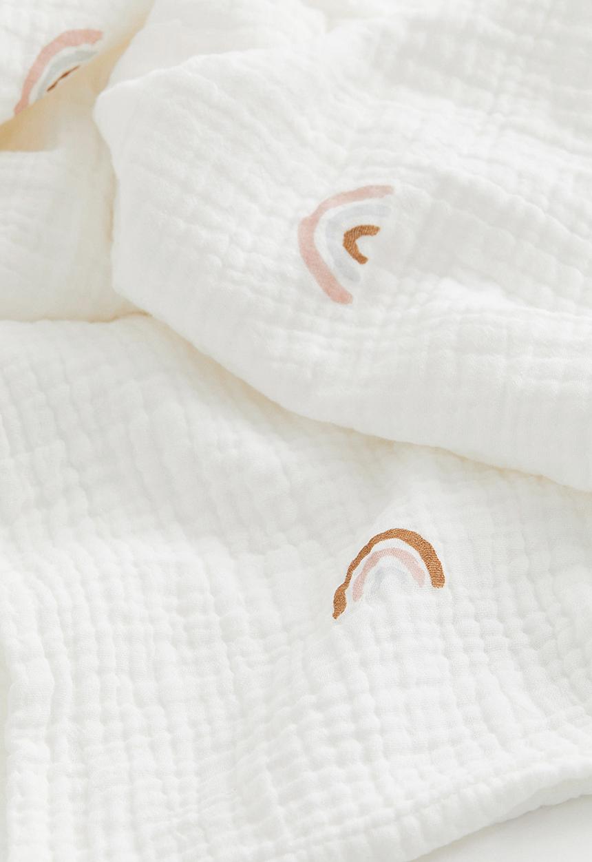 H&M - Printed muslin blanket - white rainbows
