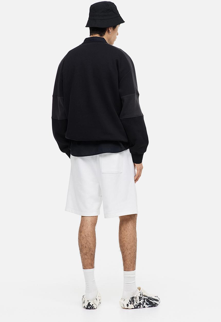 H&M - Relaxed fit printed sweat shorts - white story 