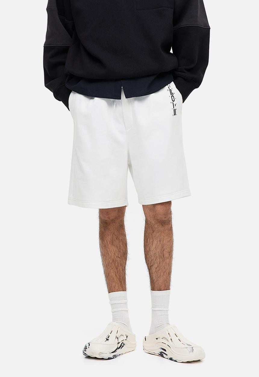 H&M - Relaxed fit printed sweat shorts - white story 