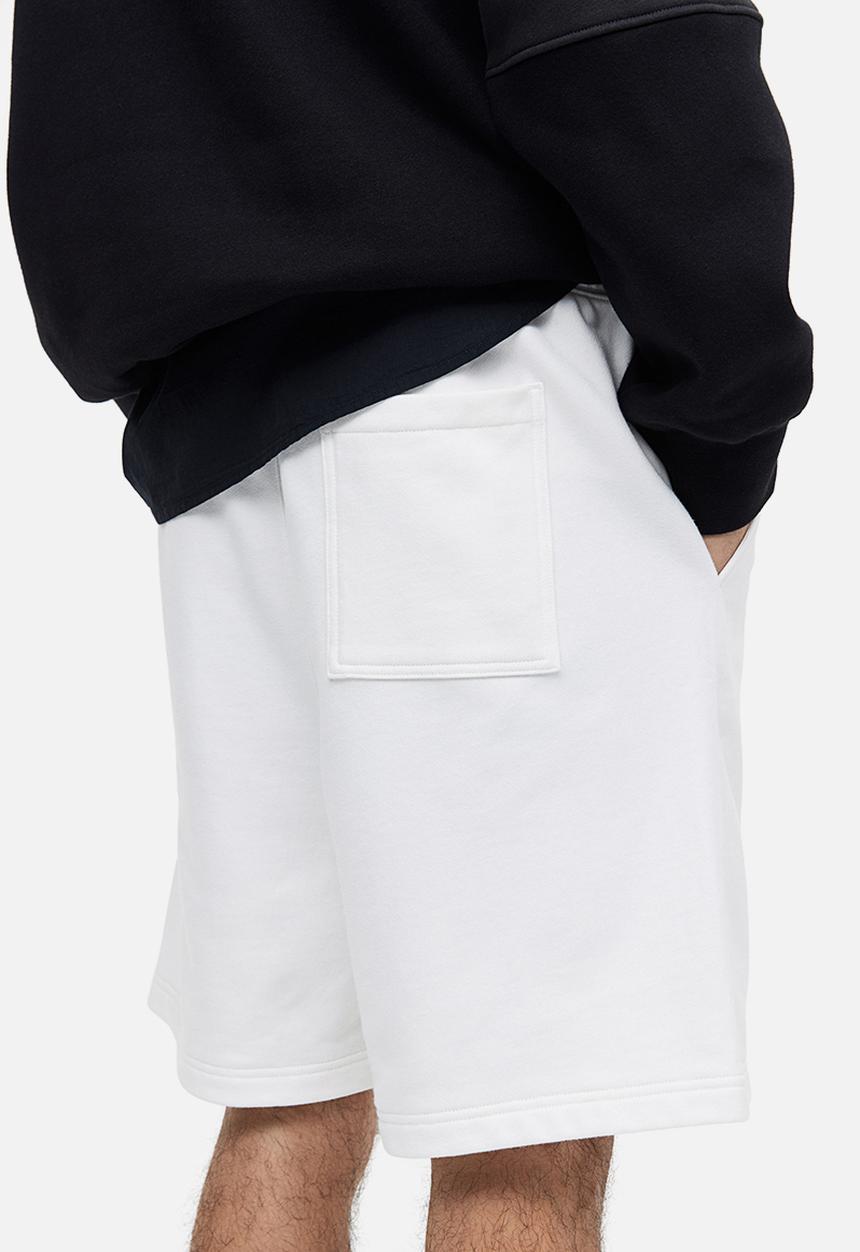 H&M - Relaxed fit printed sweat shorts - white story 