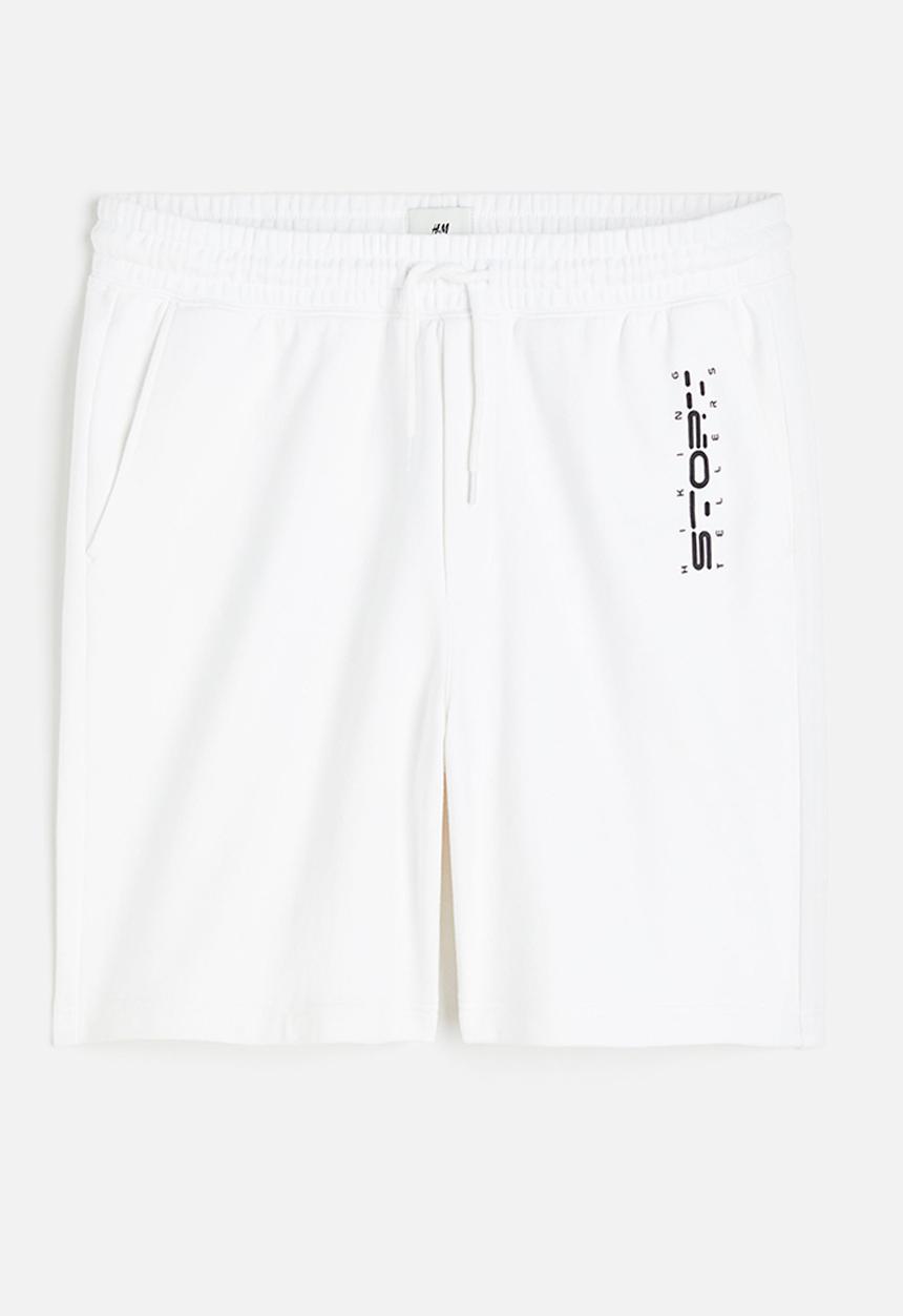 H&M - Relaxed fit printed sweat shorts - white story 